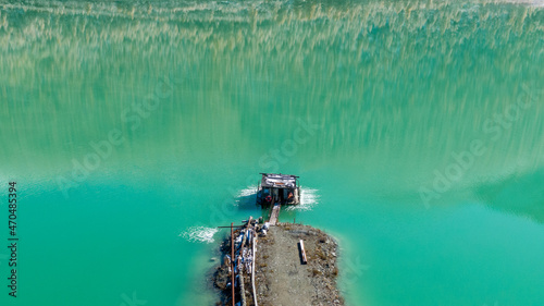 Foto dump pollution water lake mining environment tailing