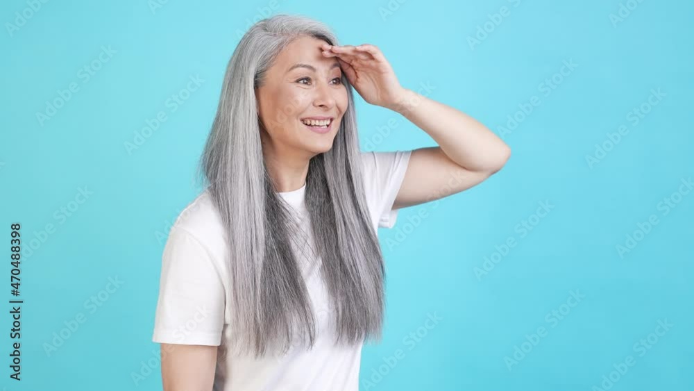 Crazy lady see incredible offer far empty space isolated blue color background Crazy lady see incredible offer far empty space isolated blue color background