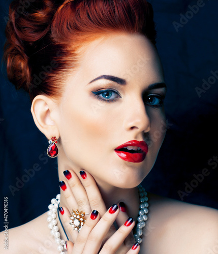beauty rich woman with bright makeup wearing luxury jewellery on black background  fashion lady
