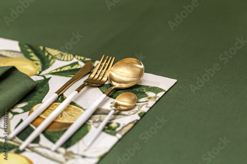 Close-up of a set of cutlery on a served table.