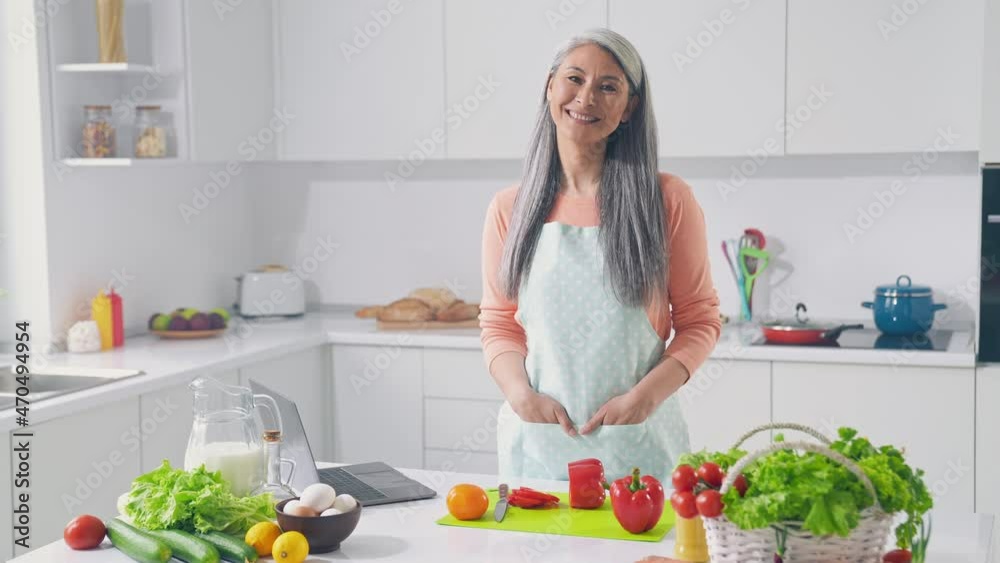 Confident lady chef ready make weightloss fresh tasty salad in kitchen Confident lady chef ready make weightloss fresh tasty salad in kitchen