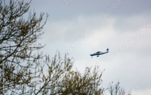 Cessna 208b Grand Caravan G-CPSS light aircraft returning to land after dropping army parachutists over Netheravon airfield Wiltshire UK