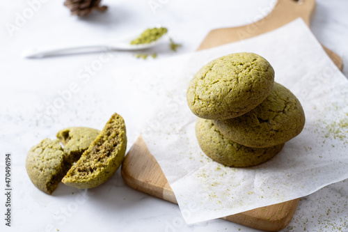 Matcha greentea cookies set on cafe table. © Tavan