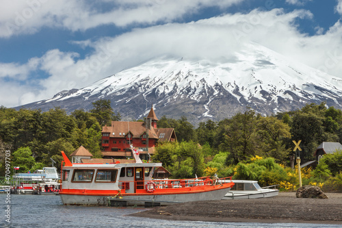 Landscape of the Osorno volcano and pier to visit the Todos los Santos lake (All Saints lake), in the lake district near Puerto Varas, Vicente Perez Rosales National Park, Chile photo