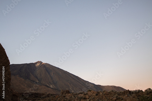 Sunset during the trekking on the Teide volcano in the natural park of tenerife. Adventure in the natural park of Teide in the canary islands, excursions and walks in nature. Healthy holidays