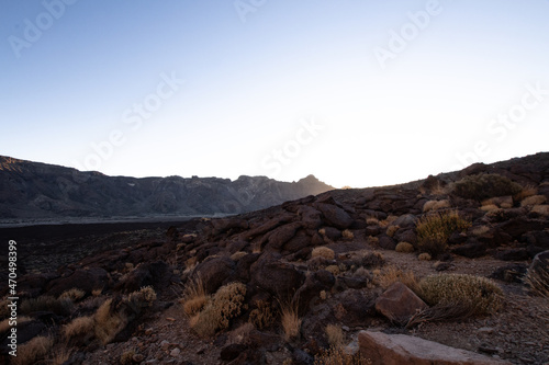 Sunset during the trekking on the Teide volcano in the natural park of tenerife. Adventure in the natural park of Teide in the canary islands, excursions and walks in nature. Healthy holidays