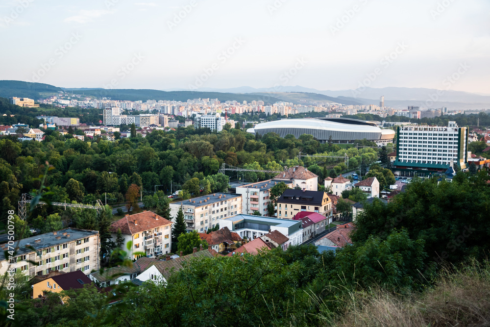 Aerial view over the city with the Cluj Arena stadium, central park and Grand Hotel Napoca. Cluj Napoca, Romania.