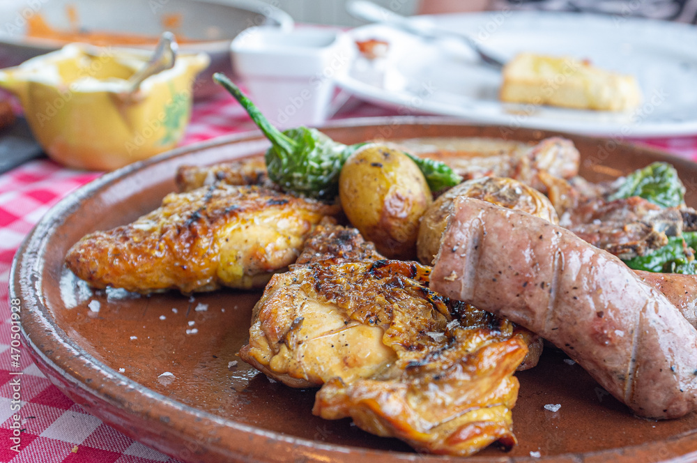 Grilled dish, barbecued chicken with garnish
