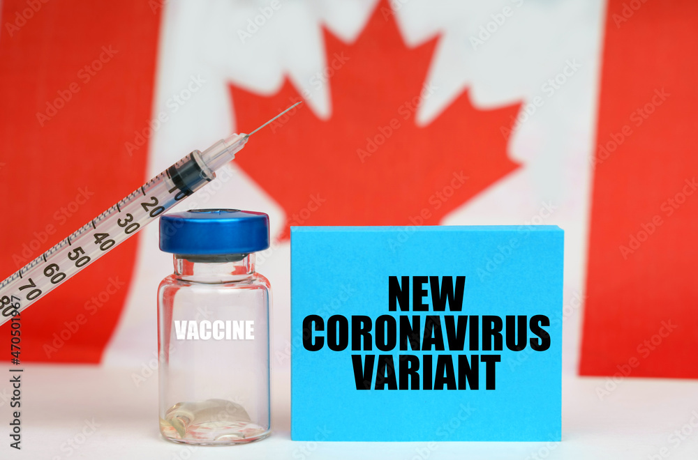 Vaccine, syringe and blue plate with the inscription - NEW CORONAVIRUS VARIANT. In the background the flag of Canada