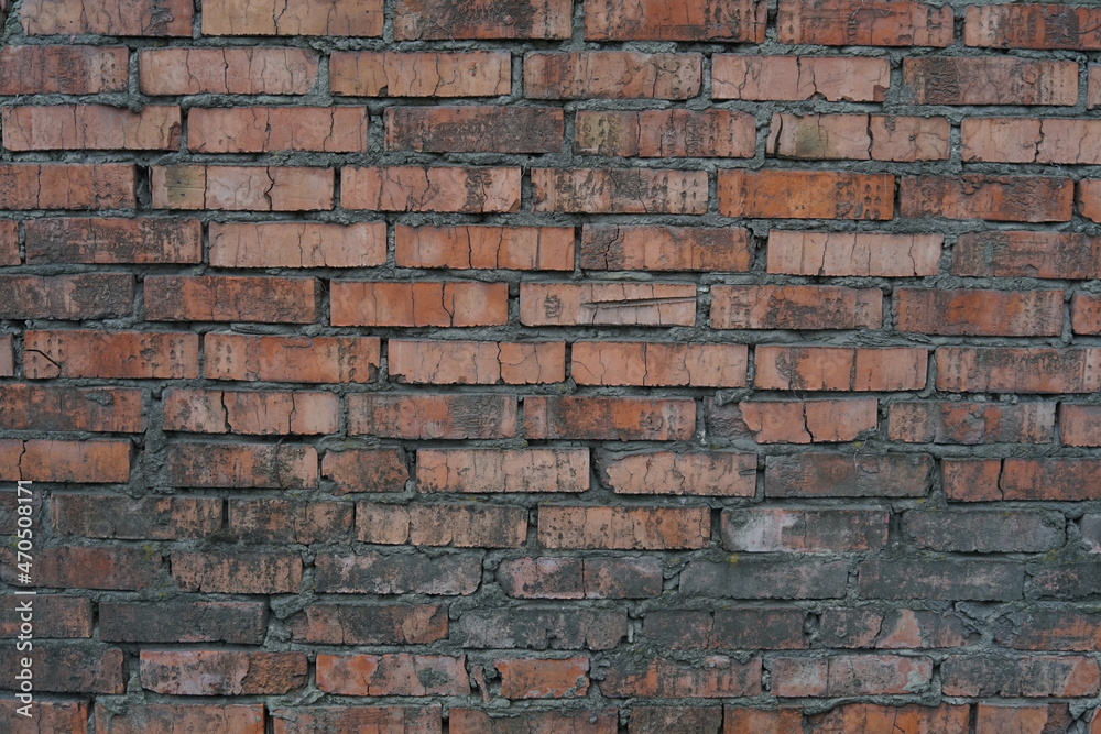 Obraz premium Old brick wall. Red brick wall. Red brick texture. The wall and brick were pretty beaten by time and rain.