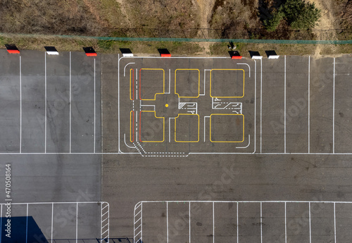 Parking at Zolder F1 racing trach parking seen from above with drone aerial top down view. Lines and patterns photo