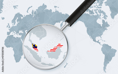 Asia centered world map with magnified glass on Malaysia. Focus on map of Malaysia on Pacific-centric World Map.