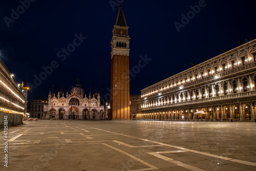 Empty St Marks Square and illuminated Basilica in the early Morning, Venice photo