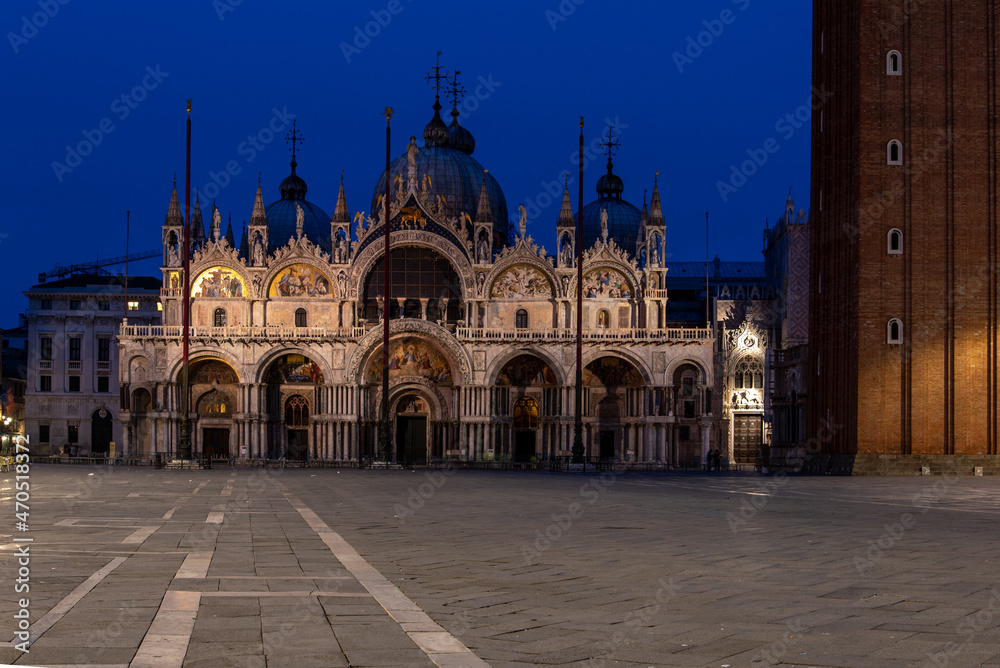 Empty St Marks Square and illuminated Basilica in the early Morning, Venice