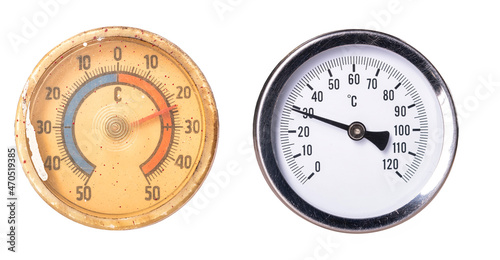 Thermometer for measuring the temperature old and new on an isolated background. photo