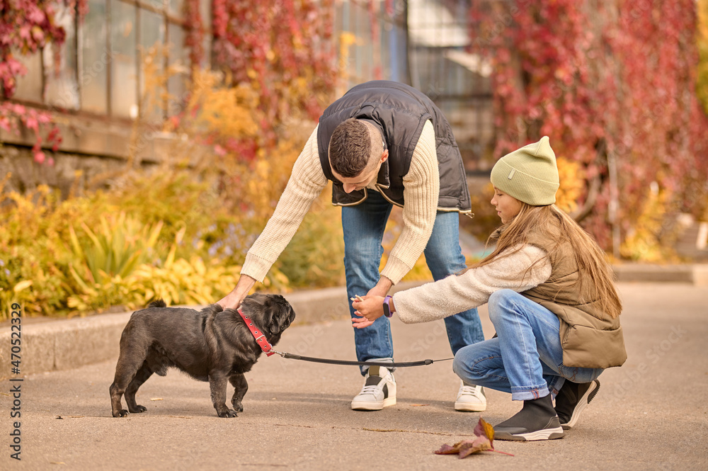 A family and their pet spending morning together A family and their pet spending morning together