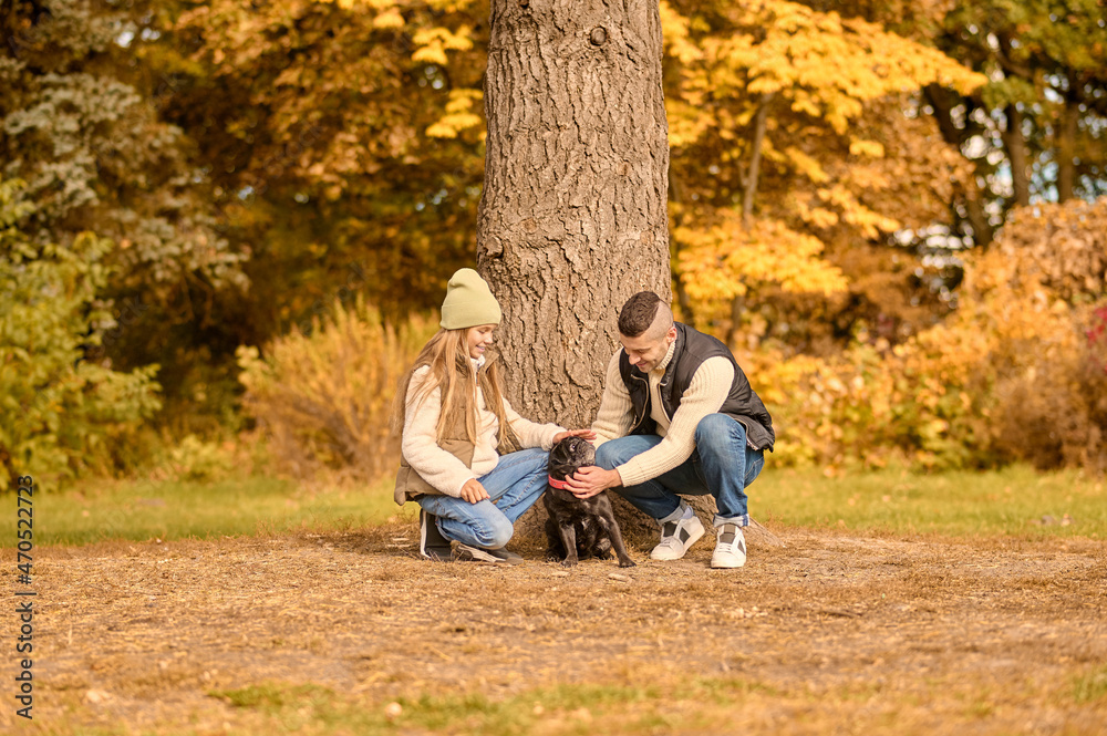 A cute family spending time together in the park