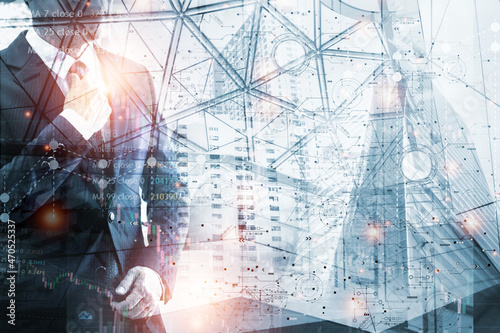 Double exposure picture.photo mix  building city with icons graph and businesswoman use notebook.deal,partnership,
Development,meeting,action.Picture concept work woman and business .