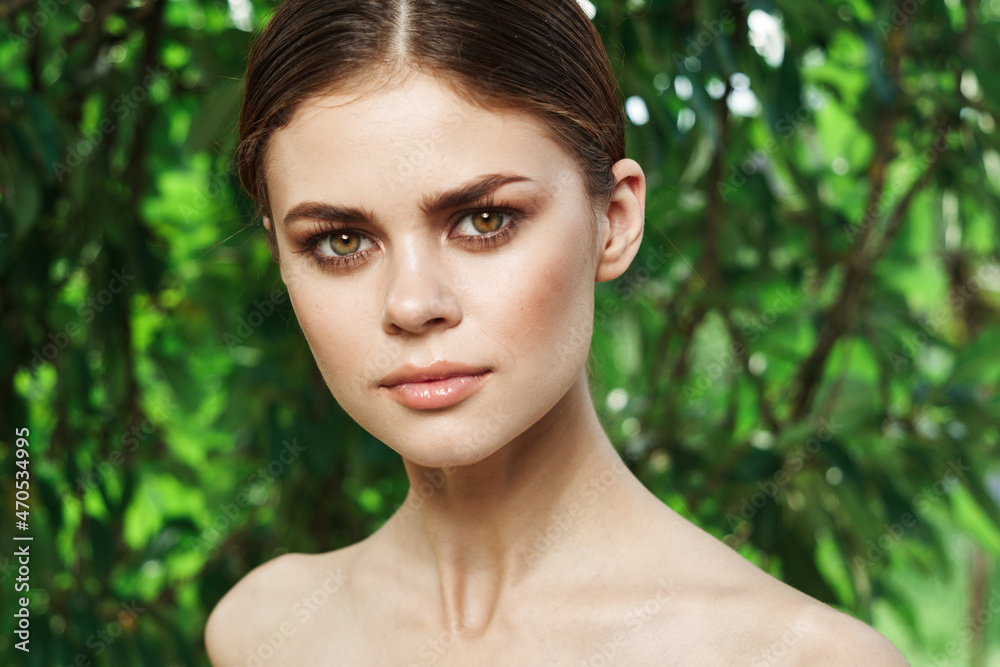 beautiful woman Cosmetology nature green leaves glamor close-up beautiful woman Cosmetology nature green leaves glamor close-up