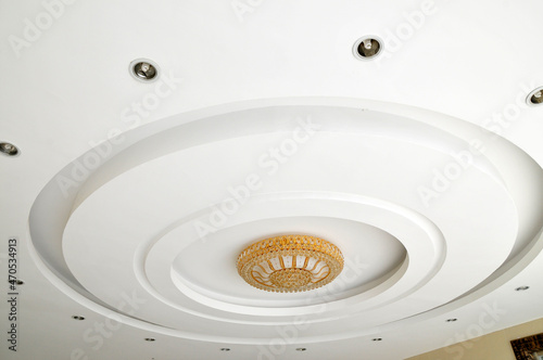 On the ceiling droplight on the ceiling droplight in hotel features photo