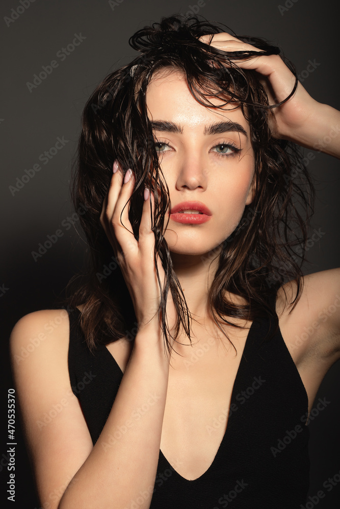 Perfect woman face portrait. Beauty sexy brunette model female with beautiful skin. Manicure, beautiful nails. Girl in fashionable gloves Perfect woman face portrait. Beauty sexy brunette model female with beautiful skin. Manicure, beautiful nails. Girl in fashionable gloves