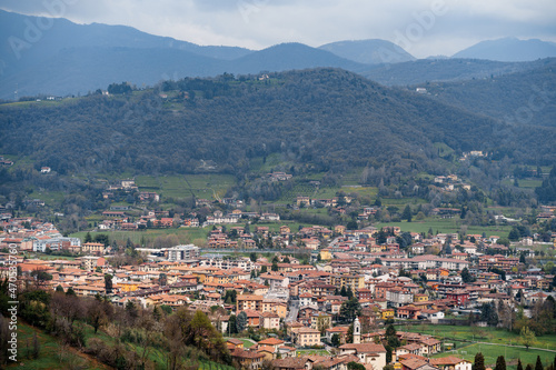 Bergamo at the foot of the green mountains. Italy