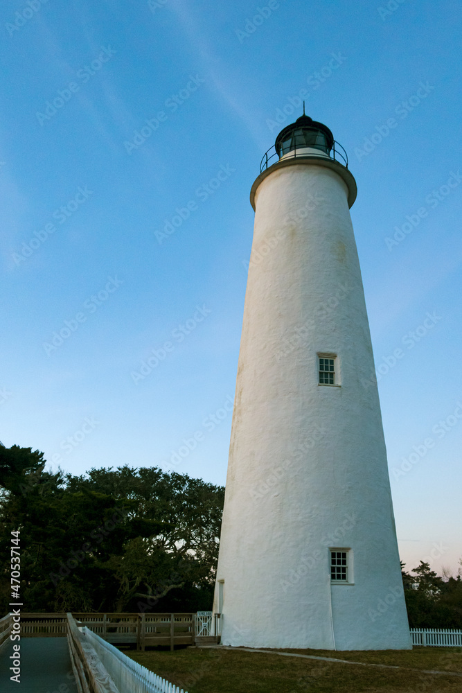 White lighthouse against a blue sky