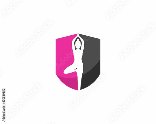 Woman ballerina in the shield logo
