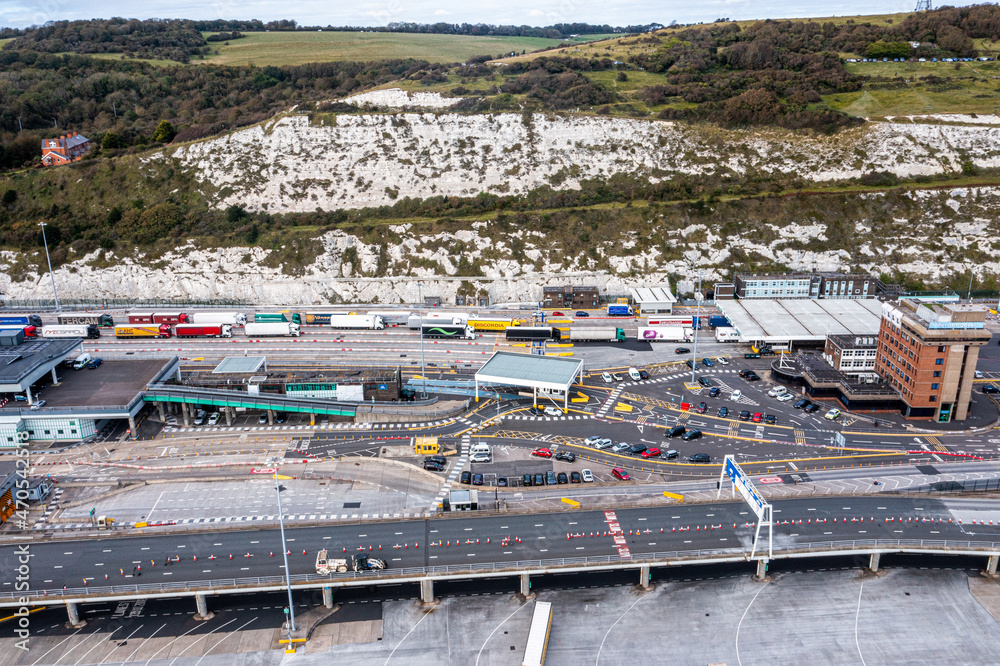 Aerial view of harbor and trucks parked along side each other getting ready for embarking the Dover Ferry to Calais