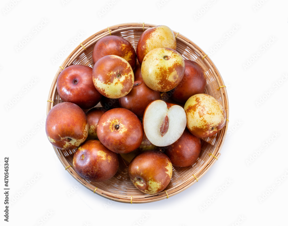 Fresh jujubes in Bamboo basket, Chocolate jujube on white background. Fresh jujubes in Bamboo basket, Chocolate jujube on white background.