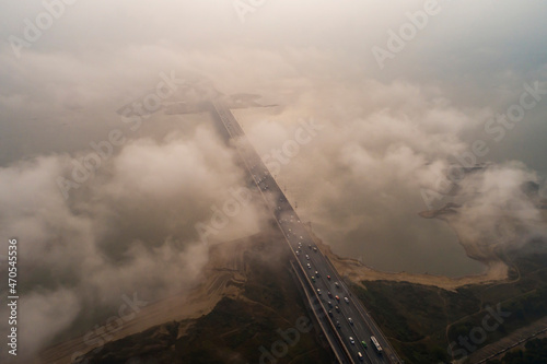 Aerial view of city traffic in heavy fog