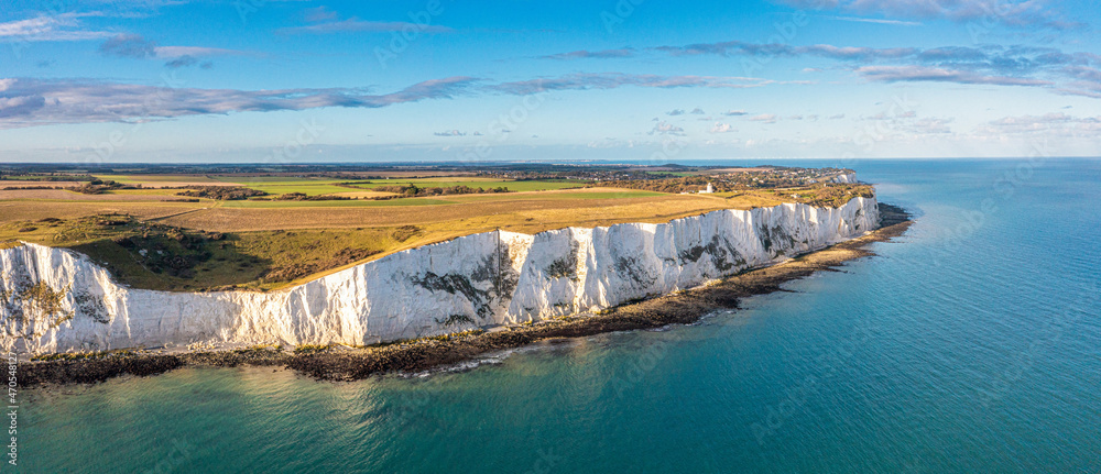 Aerial view of the White Cliffs of Dover. Close up view of the cliffs from the sea side. England, East Sussex. Between France and UK - obrazy, fototapety, plakaty 