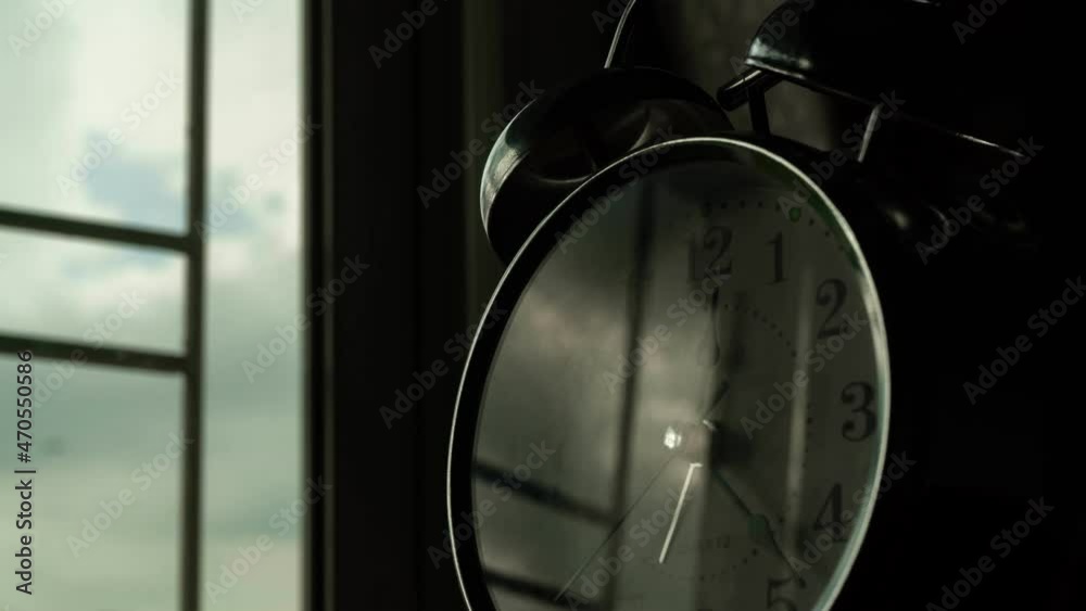 Time lapse of clock in 1 hour with reflection of cloudy sky