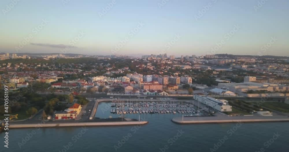 Watching the marine of Lisbon over river in a huge sunrise Watching the marine of Lisbon over river in a huge sunrise