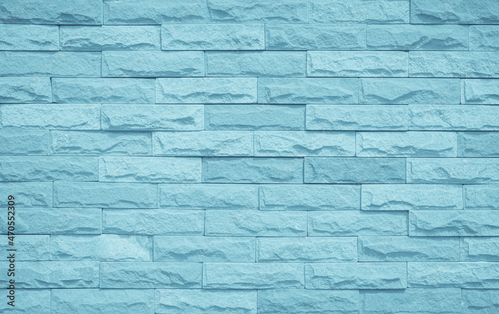 Obraz premium Brick wall painted with pale blue paint pastel calm tone texture background. 