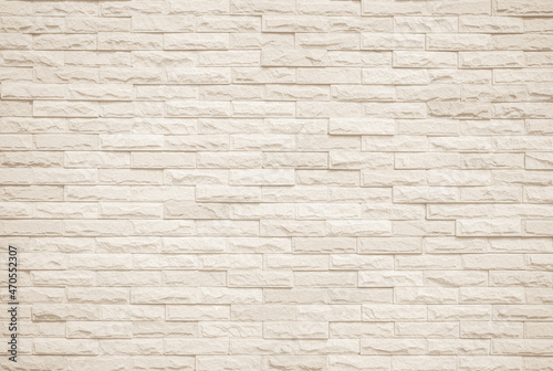 Cream and white brick wall texture background. Brickwork and stonework flooring interior backdrop