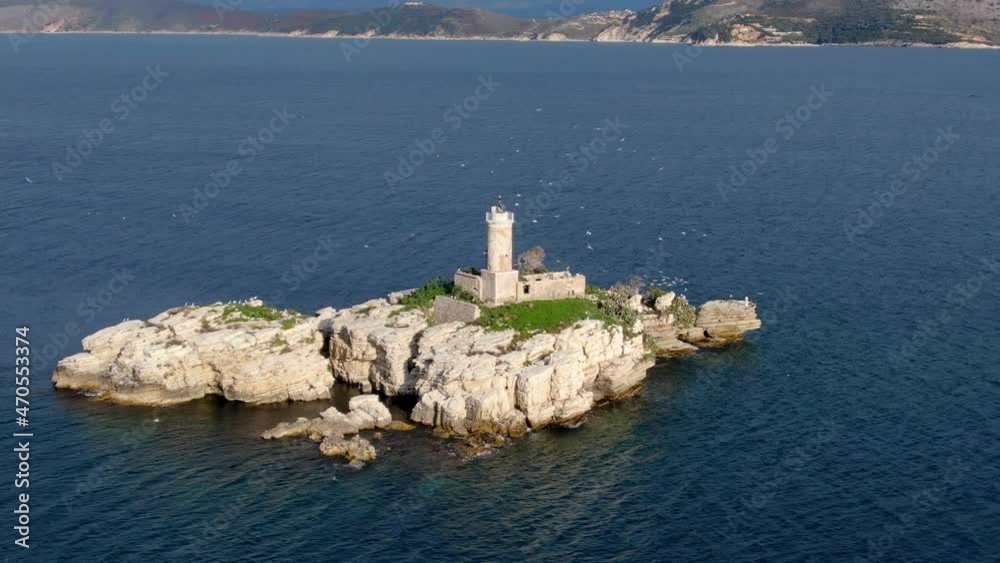 Aerial beautiful view of lighthouse with seagulls in corfu greece