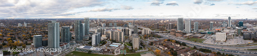 Panoramas drone view of the don valley highway as well as condos traffic hotels and houses