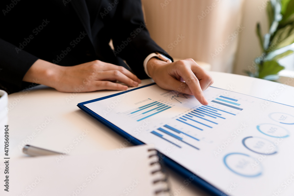 Close up of accountant or banker checking investment results, calculates financial savings, calculates annual taxes and economic concepts. Financial calculation concept. Close up of accountant or banker checking investment results, calculates financial savings, calculates annual taxes and economic concepts. Financial calculation concept.