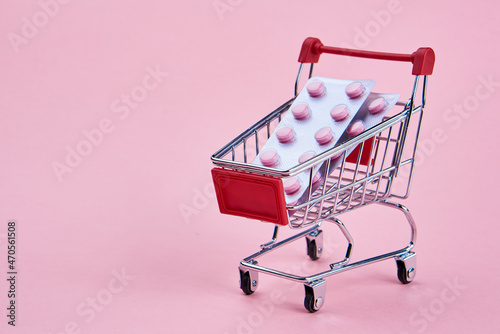 small cart with a pack of drugs pharmacy shopping service medicine