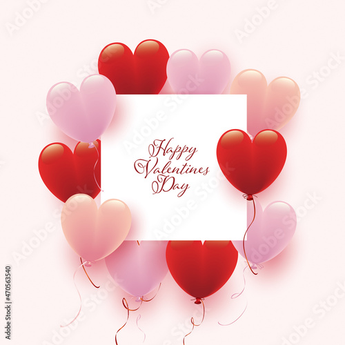 赤とピンクのハート形風船とバレンタインデーカード