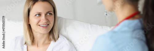 Doctor hands over signature document to patient at hospital closeup © megaflopp