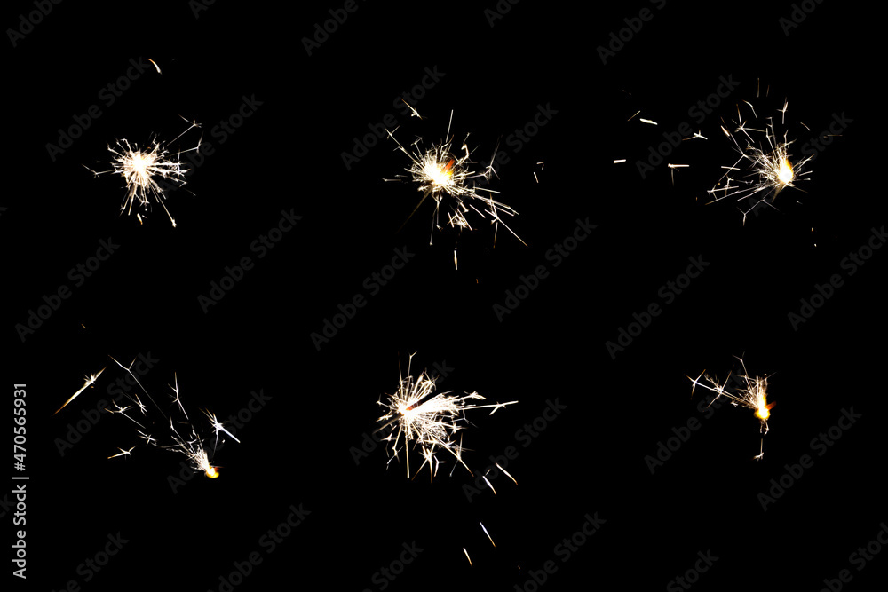 6 pack of celebration Sparklers Isolated on black background. Sparklers sparks from burning Pyrotechnics on Black overlay. Orange celebration fireworks Glitter lights for party and event designs. 6 pack of celebration Sparklers Isolated on black background. Sparklers sparks from burning Pyrotechnics on Black overlay. Orange celebration fireworks Glitter lights for party and event designs.
