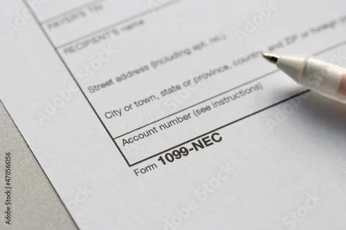 Closeup of Form 1099-NEC, Nonemployee Compensation. The IRS has reintroduced Form 1099-NEC as the new way to report self-employment income instead of Form 1099-MISC as traditionally had been used. photo