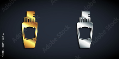 Gold and silver Tube of hand cream icon isolated on black background. Long shadow style. Vector