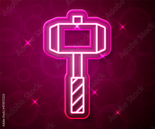 Glowing neon line Medieval battle hammer icon isolated on red background. Vector