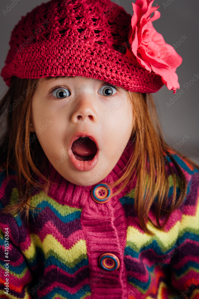 Portrait of a little girl with a surprise expression Portrait of a little girl with a surprise expression