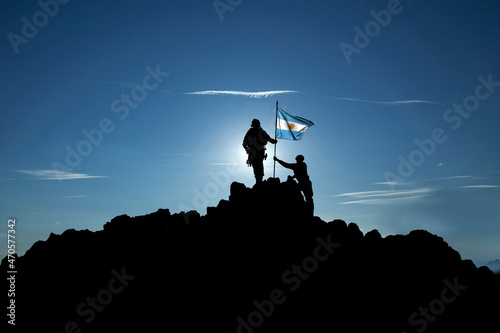Obraz na plátně Two soldiers raise the Argentine flag