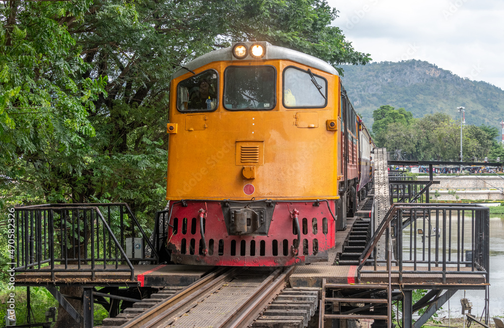 Train crossing the historic bridge over the River Kwai at Kanchanaburi Thailand on the old Burma Railway Train crossing the historic bridge over the River Kwai at Kanchanaburi Thailand on the old Burma Railway