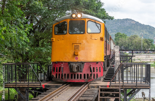 Train crossing the historic bridge over the River Kwai at Kanchanaburi Thailand on the old Burma Railway